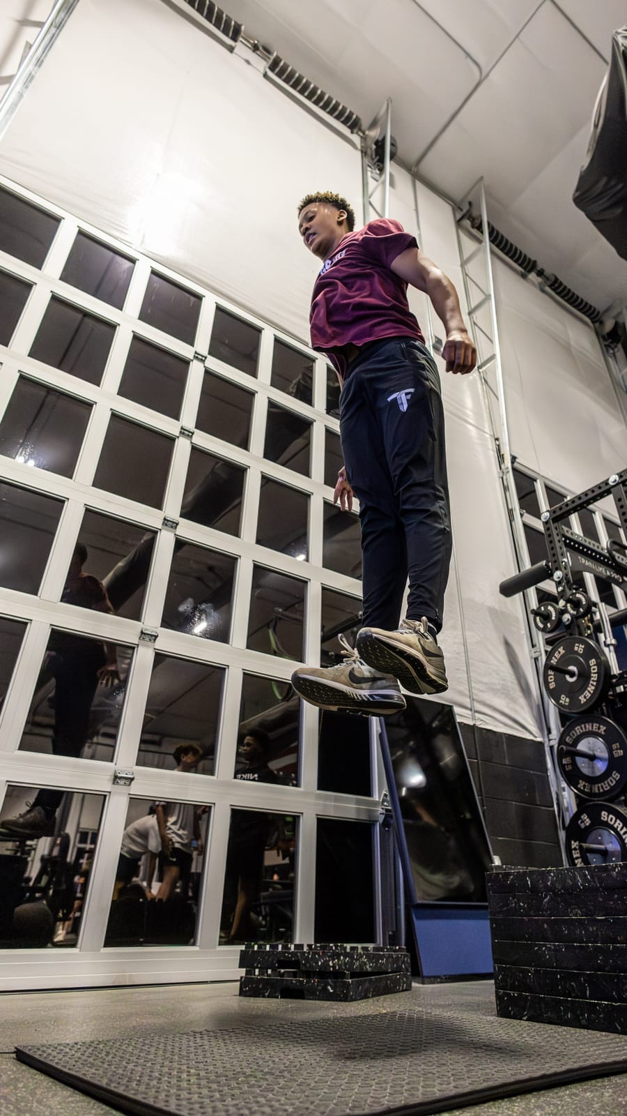 Athlete jumping on the mat